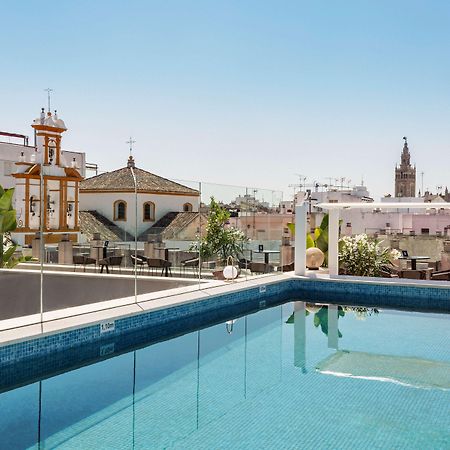 Radisson Collection Hotel, Magdalena Plaza Sevilla Kültér fotó Rooftop pool at Hotel Casa 1800